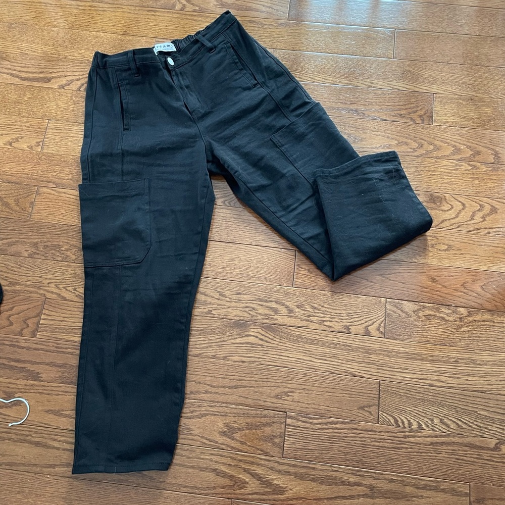 Black ankle cargo denim pants, never worn. No tags